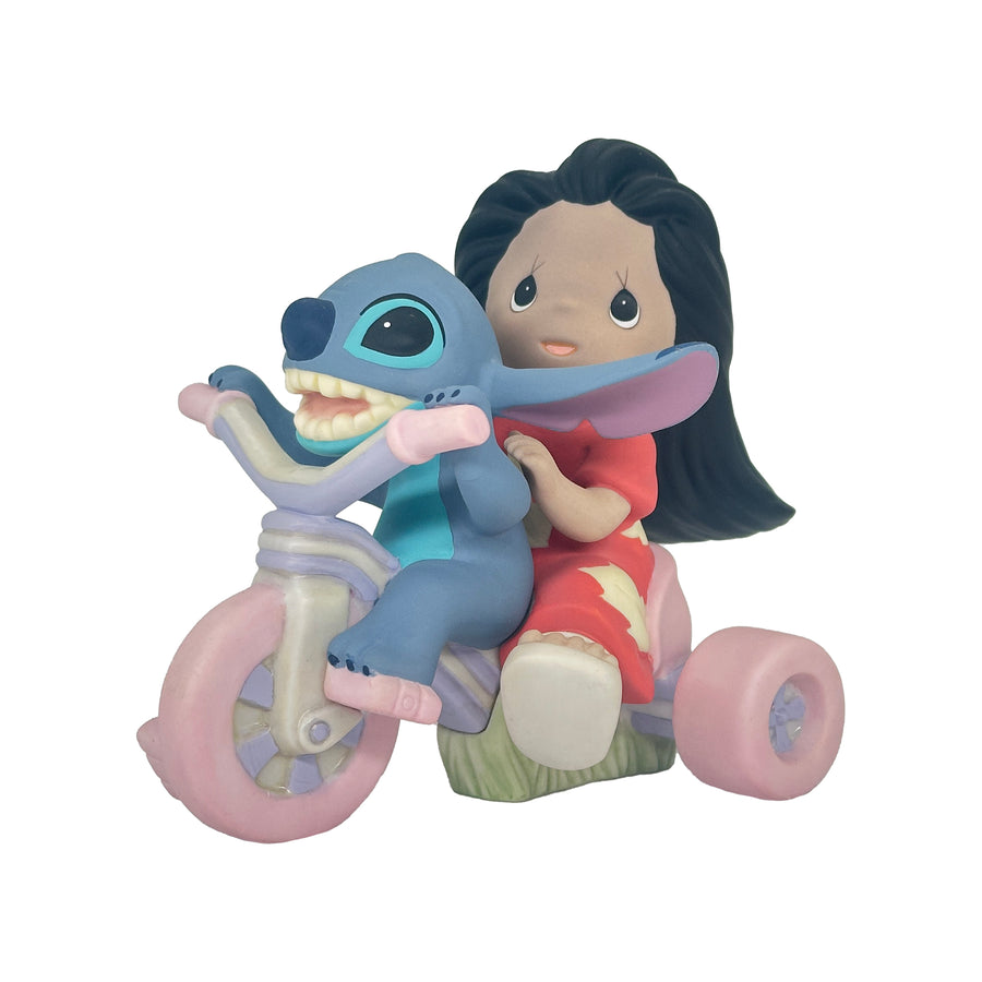 Precious Moments Disney Showcase: Lilo & Stitch Riding Big Wheel Figurine sparkle-castle