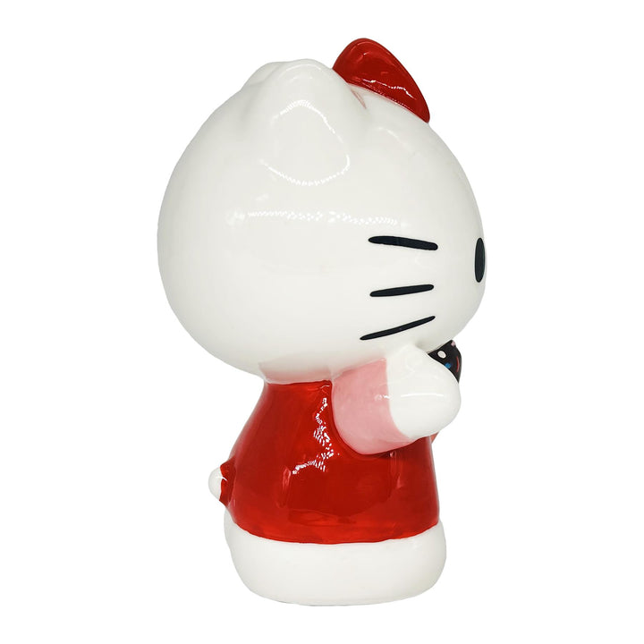 Blue Sky Clayworks: Hello Kitty Holding Chocolate Covered Strawberry Figurine sparkle-castle
