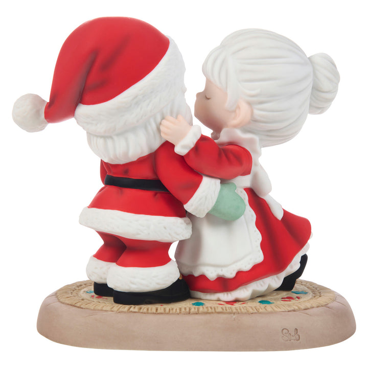 Precious Moments: Mrs. Claus Kissing Santa Goodbye Figurine sparkle-castle