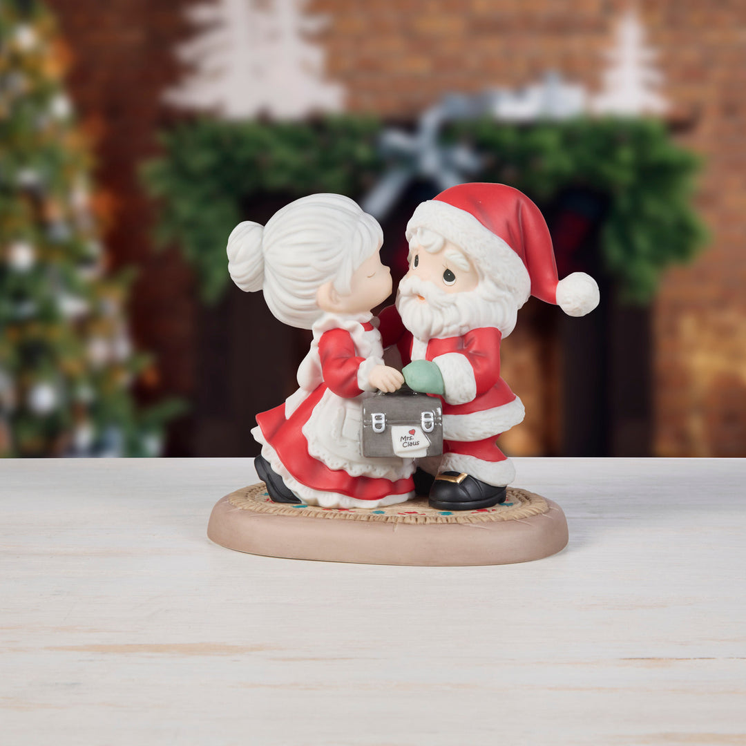 Precious Moments: Mrs. Claus Kissing Santa Goodbye Figurine sparkle-castle