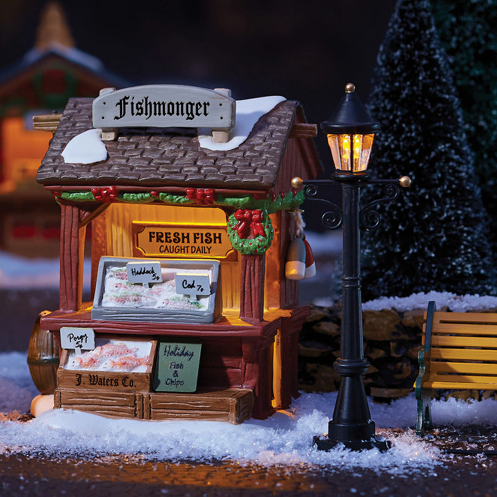 Department 56 Dickens Snow Village: Fishmonger sparkle-castle