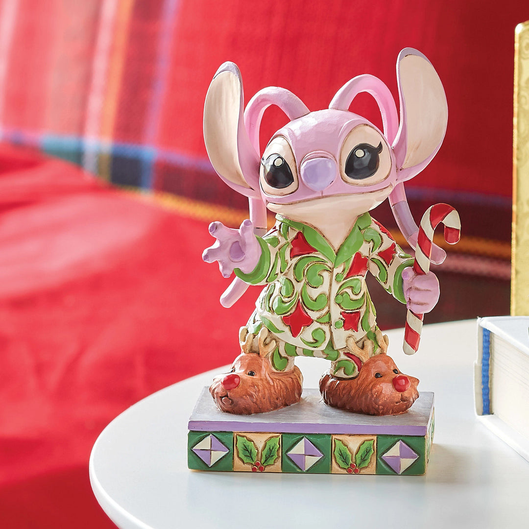 Jim Shore Disney Traditions: Angel In Christmas PJ's Personality Pose Figurine sparkle-castle