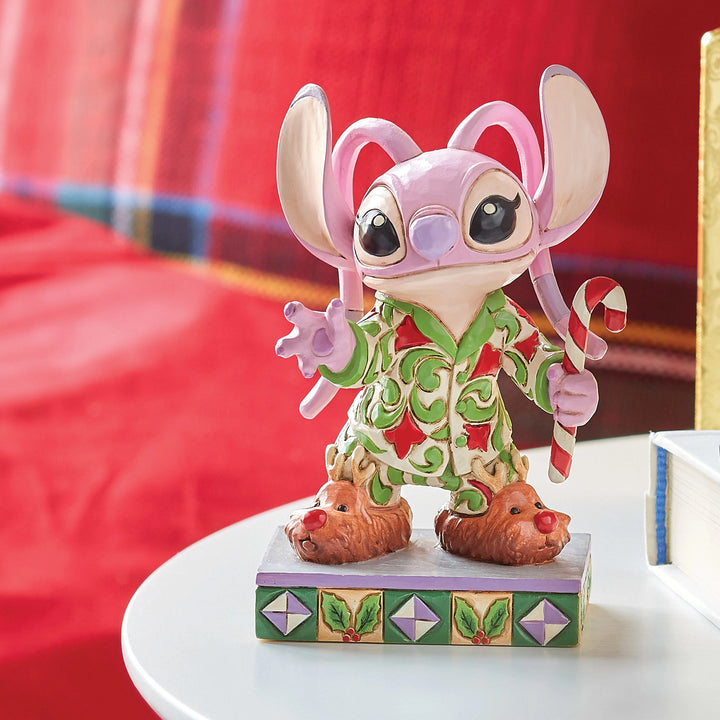 Jim Shore Disney Traditions: Angel In Christmas PJ's Personality Pose Figurine sparkle-castle