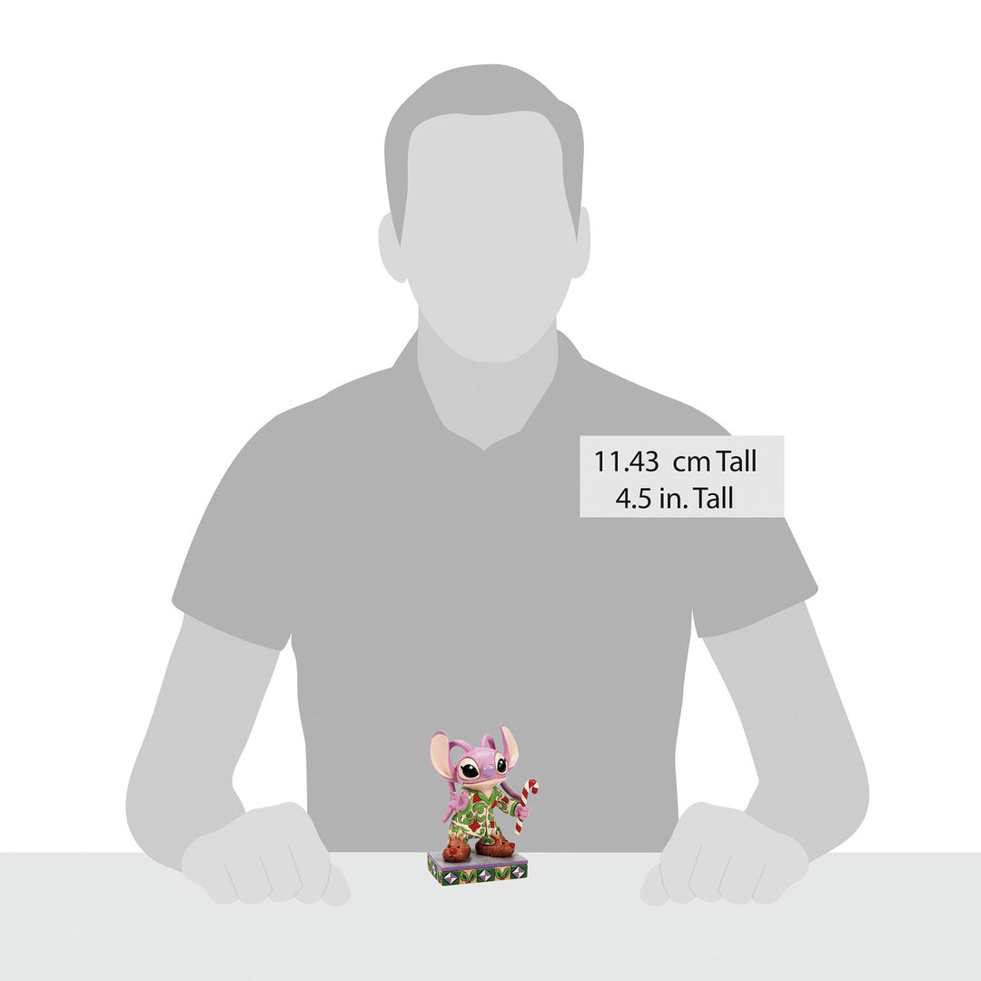Jim Shore Disney Traditions: Angel In Christmas PJ's Personality Pose Figurine sparkle-castle