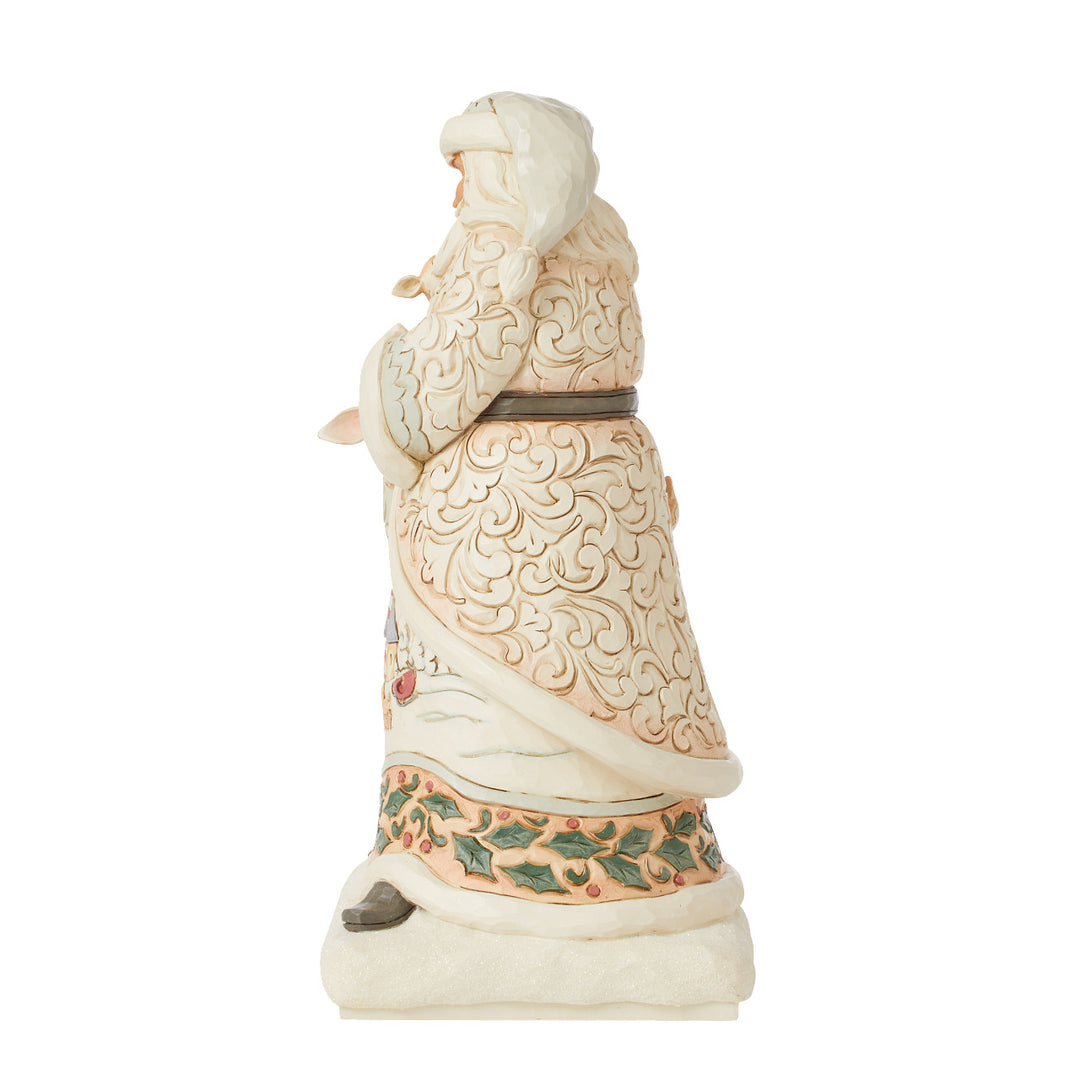 Jim Shore Heartwood Creek: White Woodland Santa Holding Fawn Figurine sparkle-castle