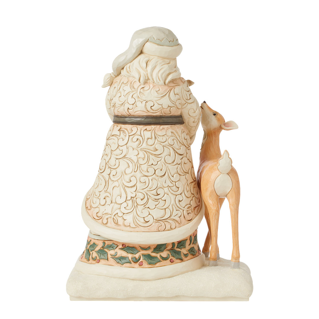 Jim Shore Heartwood Creek: White Woodland Santa Holding Fawn Figurine sparkle-castle