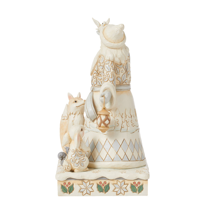 Jim Shore Heartwood Creek: White Woodland Santa Holding Dove and Lantern Figurine sparkle-castle