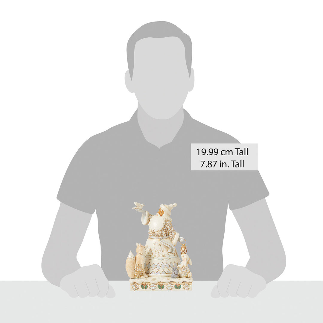 Jim Shore Heartwood Creek: White Woodland Santa Holding Dove and Lantern Figurine sparkle-castle