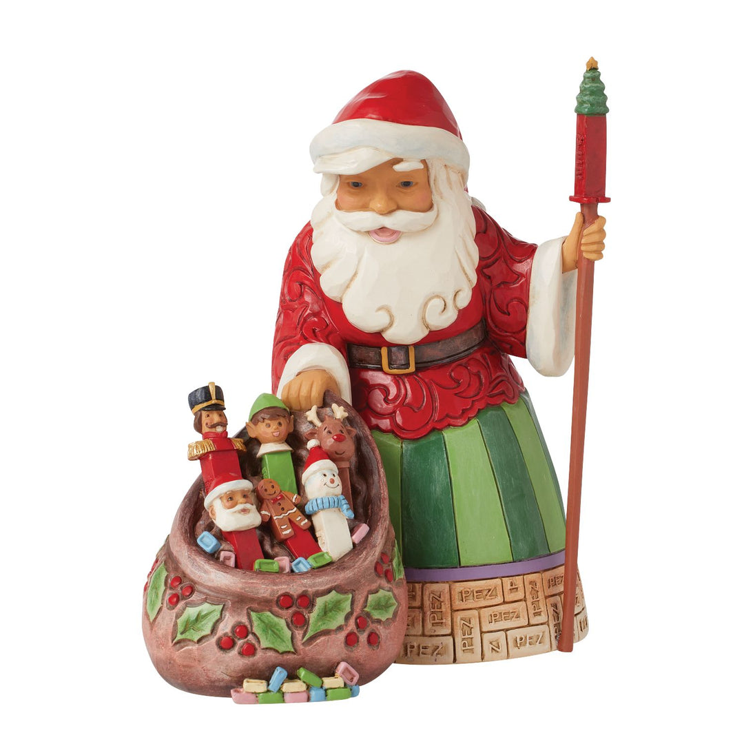 Jim Shore PEZ: Santa Holding Gift Bag Filled With PEZ Figurine sparkle-castle