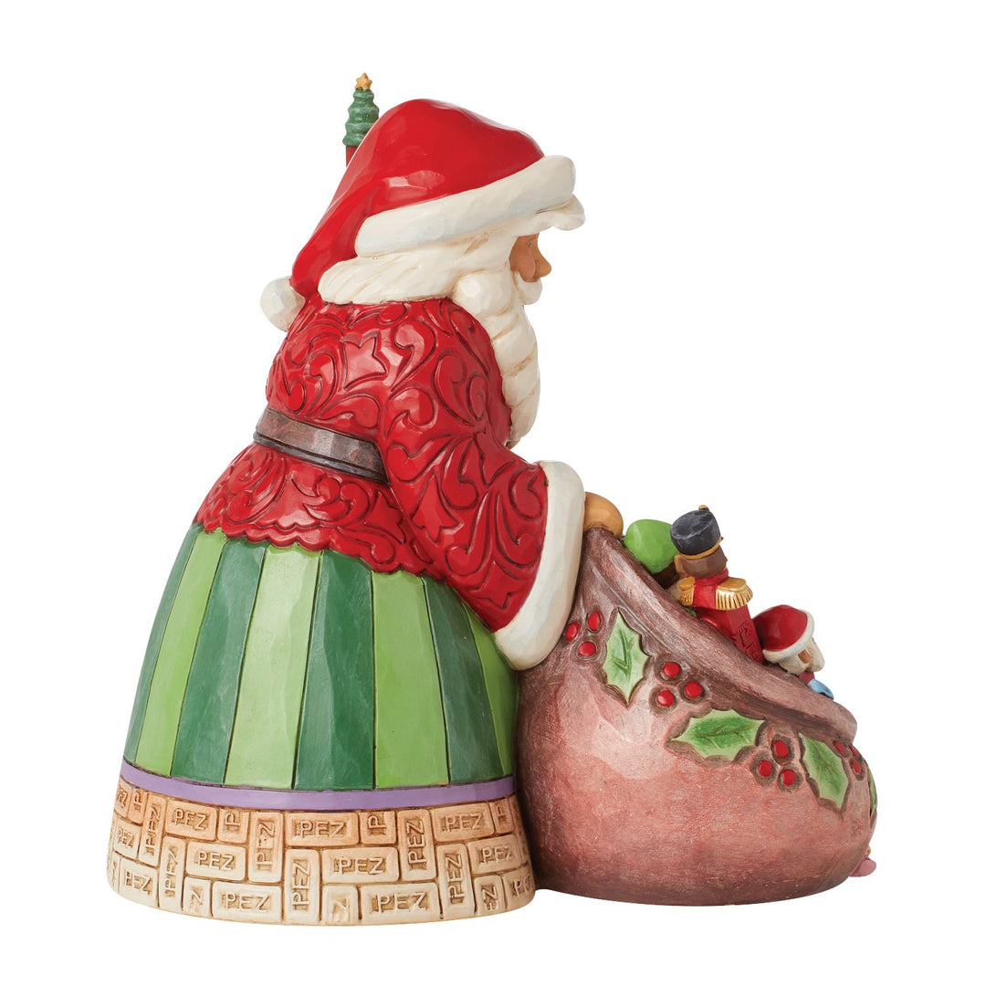 Jim Shore PEZ: Santa Holding Gift Bag Filled With PEZ Figurine sparkle-castle
