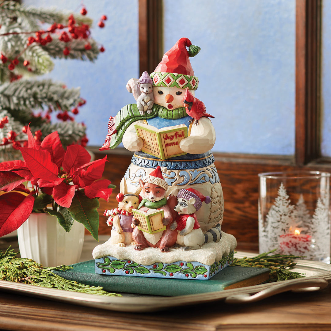 Jim Shore Heartwood Creek: Snowman & Animals Caroling Figurine sparkle-castle