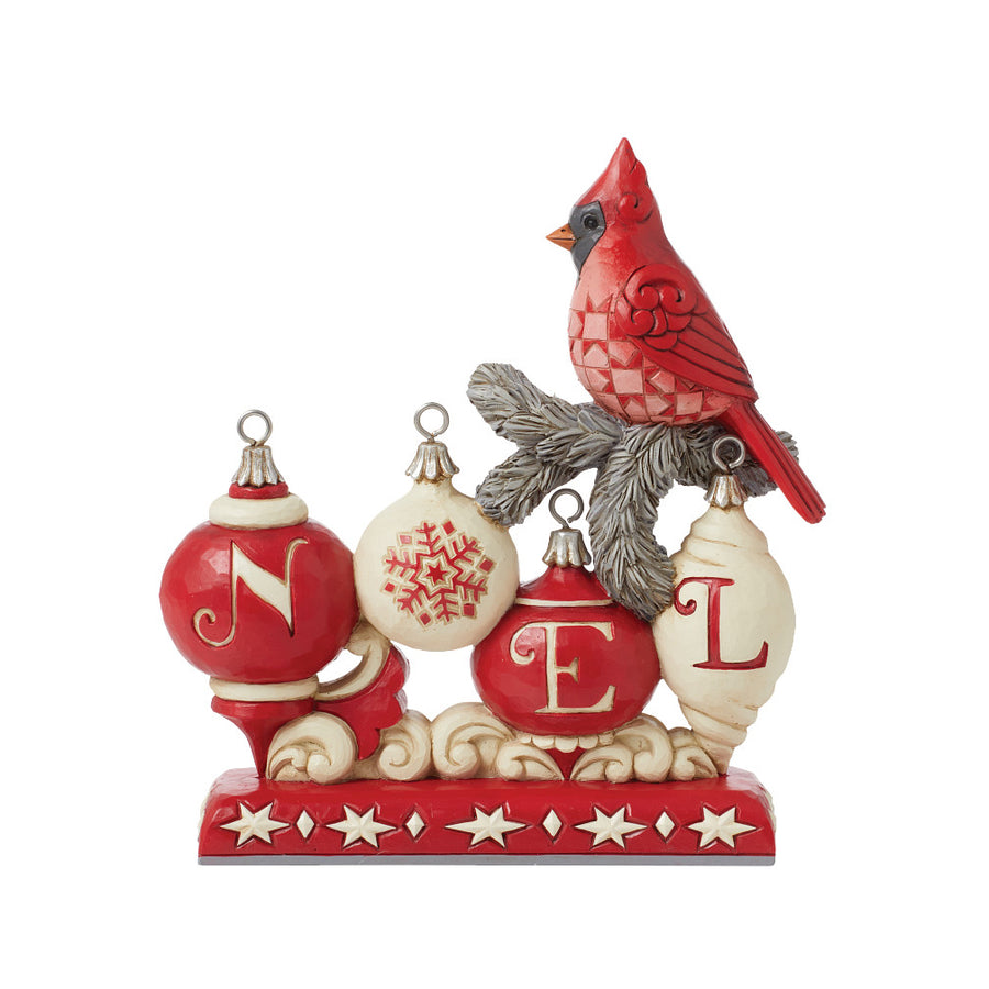 Jim Shore Heartwood Creek: Nordic Noel Cardinal on NOEL Sign Figurine sparkle-castle
