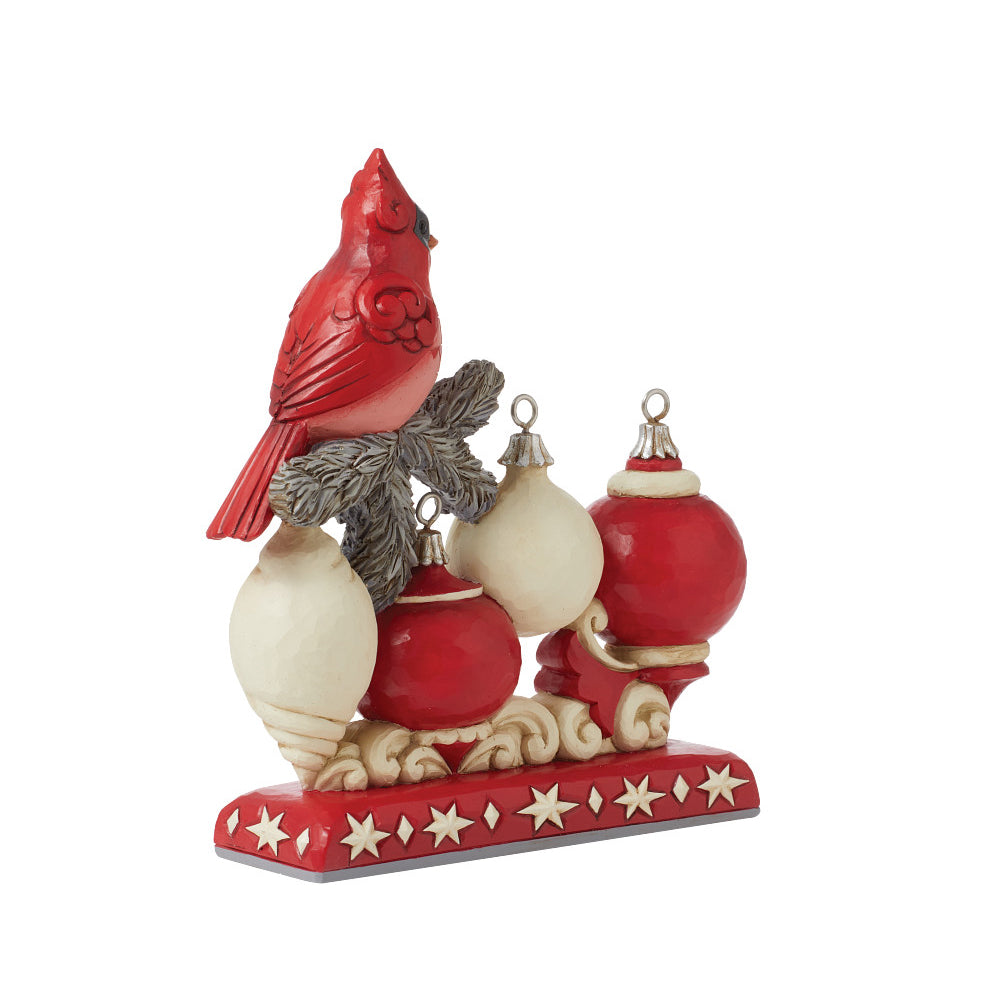 Jim Shore Heartwood Creek: Nordic Noel Cardinal on NOEL Sign Figurine sparkle-castle