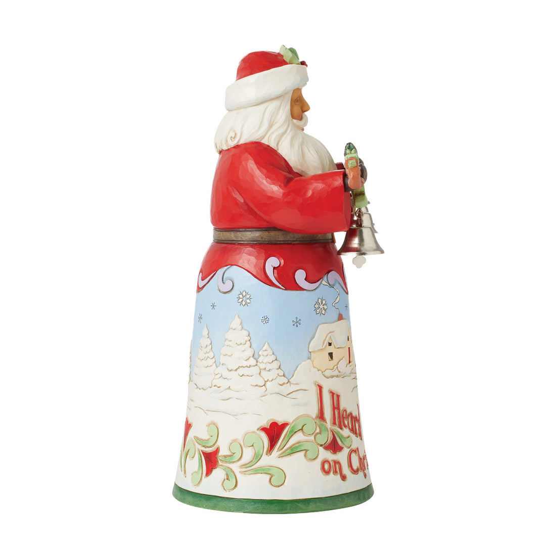 Jim Shore Heartwood Creek: 18th Annual Caroling Santa Figurine sparkle-castle
