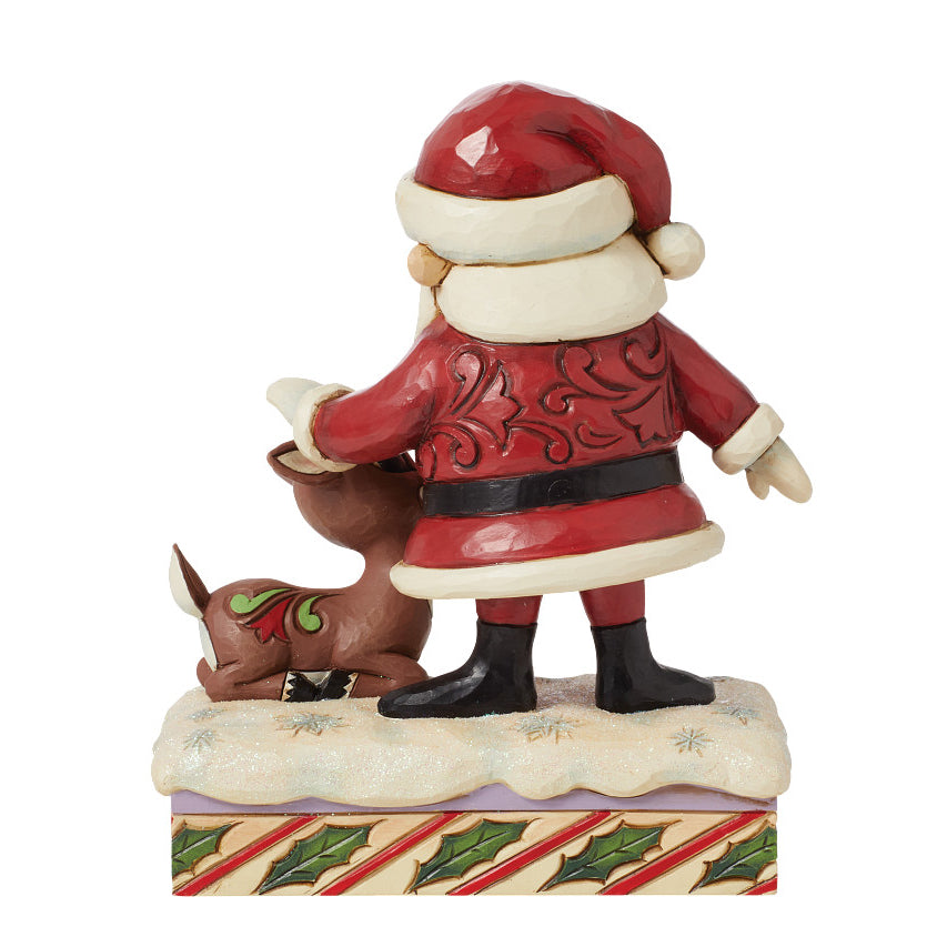 Jim Shore Rudolph Traditions: Santa Petting Rudolph Figurine sparkle-castle