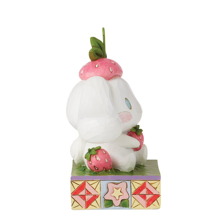 Jim Shore Sanrio: Cinnamoroll With Strawberry Figurine sparkle-castle