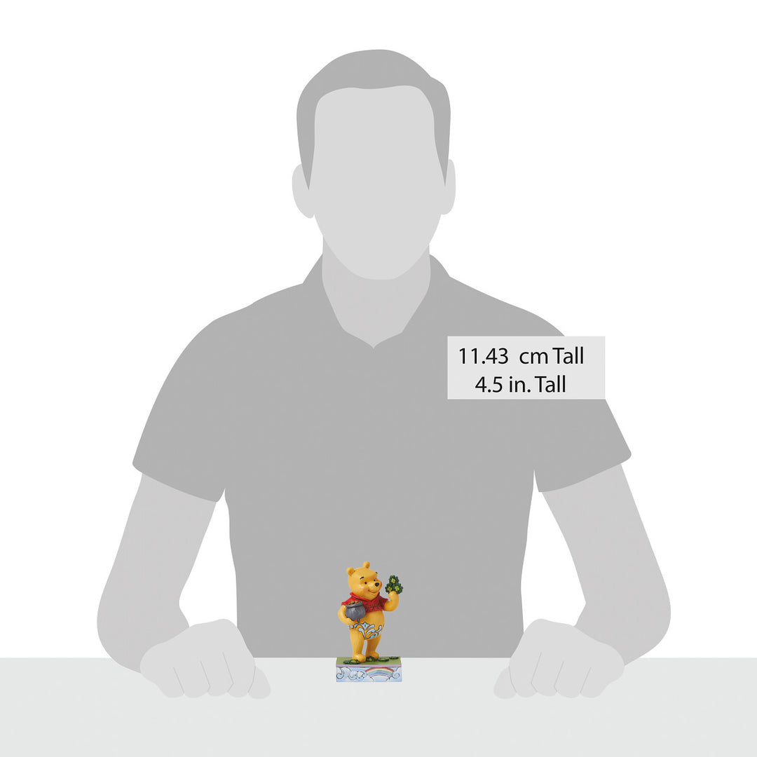 Jim Shore Disney Traditions: Pooh with Clovers And Pot Of Gold Figurine sparkle-castle