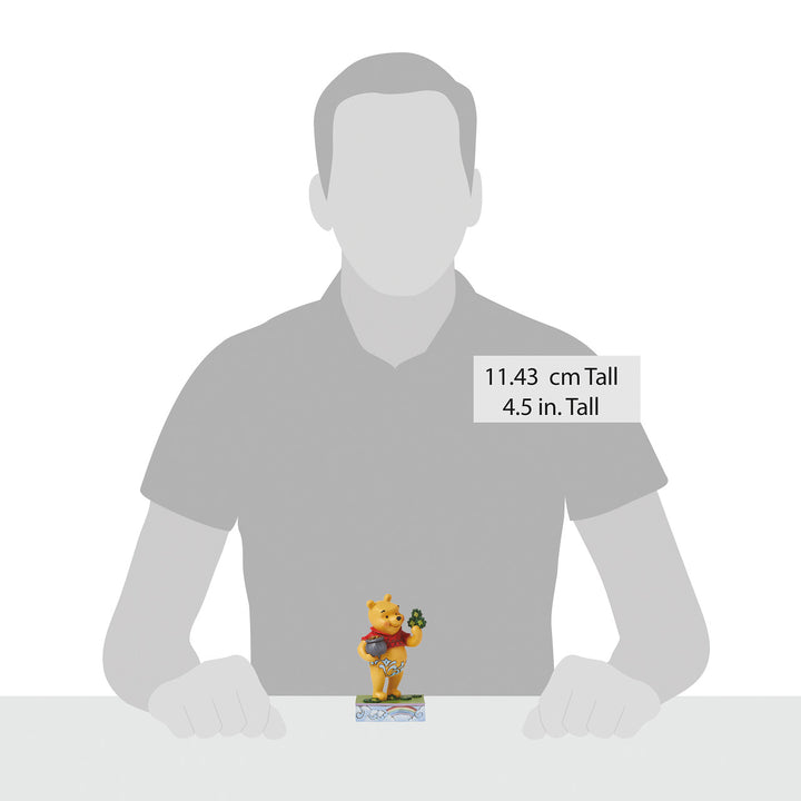 Jim Shore Disney Traditions: Pooh with Clovers And Pot Of Gold Figurine sparkle-castle