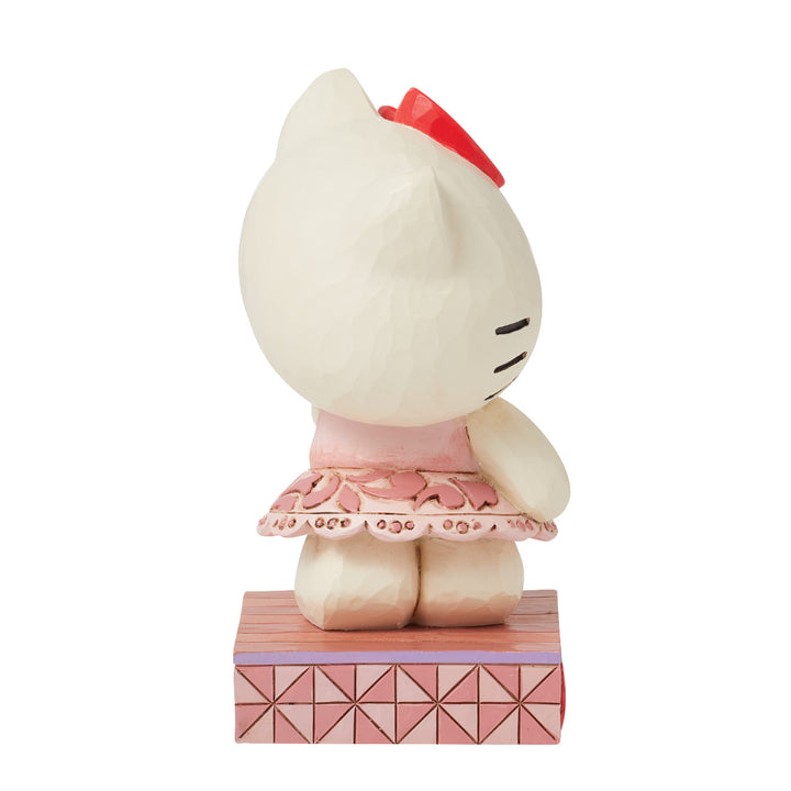 Jim Shore Sanrio: Hello Kitty With Rose Personality Pose Figurine sparkle-castle