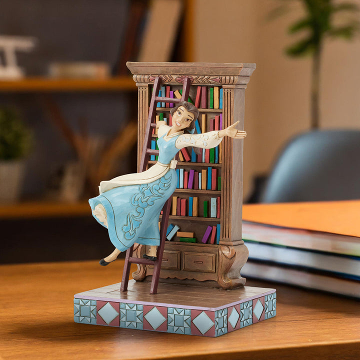 Jim Shore Disney Traditions: Belle with Bookshelf Figurine sparkle-castle
