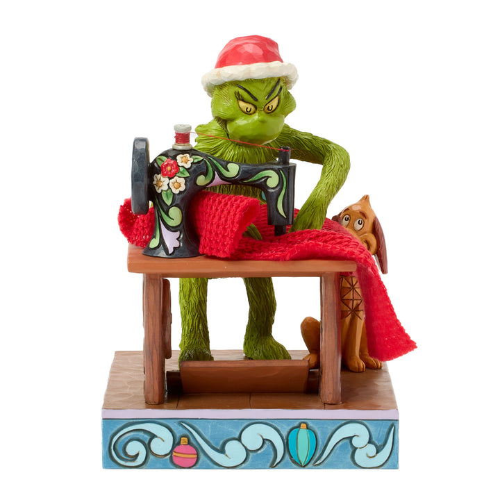 Jim Shore The Grinch: Grinch Sewing Santa Suit Figurine sparkle-castle