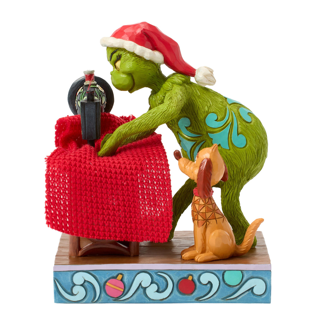 Jim Shore The Grinch: Grinch Sewing Santa Suit Figurine sparkle-castle