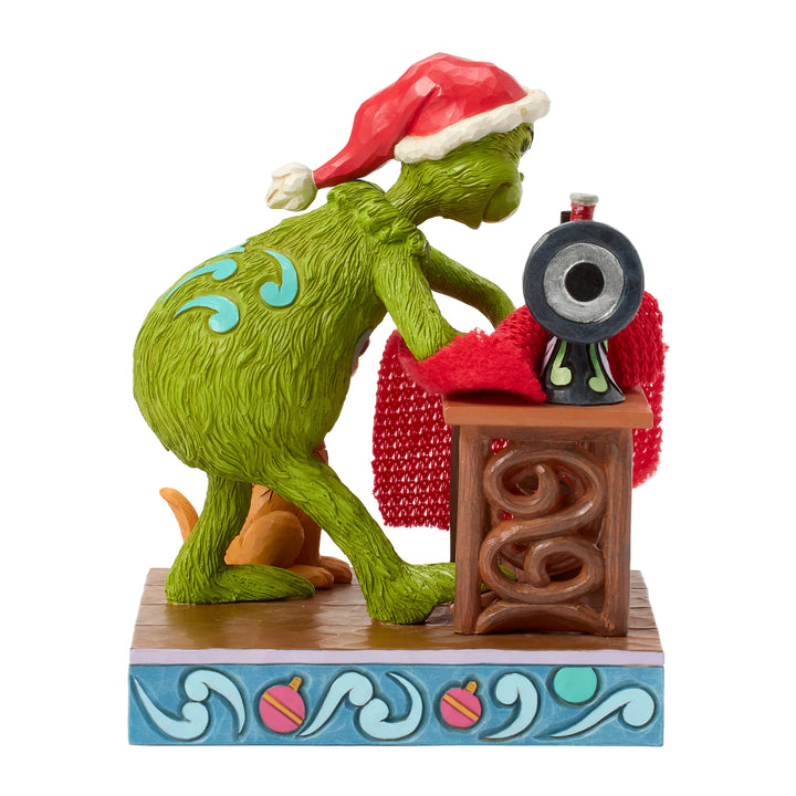 Jim Shore The Grinch: Grinch Sewing Santa Suit Figurine sparkle-castle