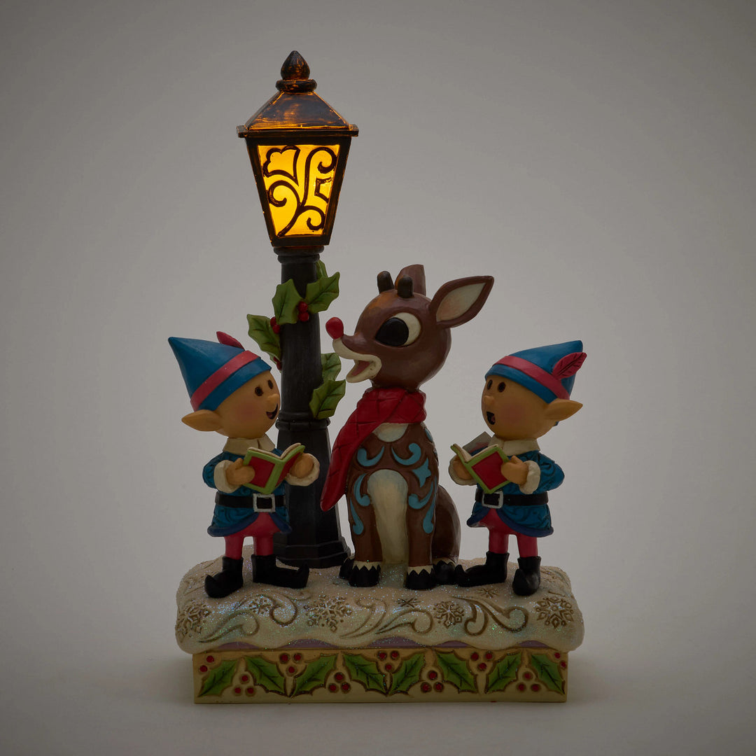 Jim Shore Rudolph Traditions: Rudolph and Elves Caroling Figurine sparkle-castle