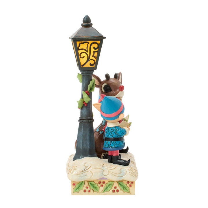 Jim Shore Rudolph Traditions: Rudolph and Elves Caroling Figurine sparkle-castle