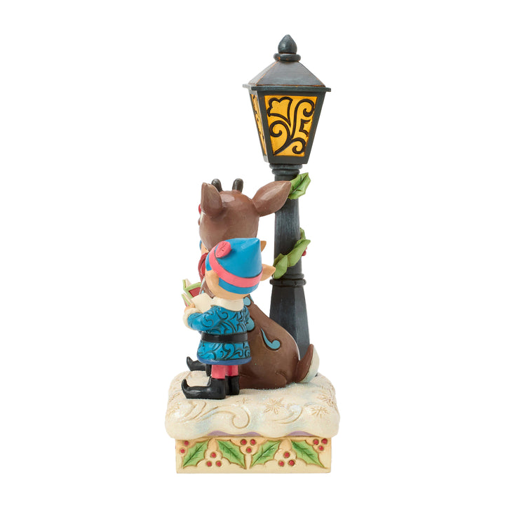 Jim Shore Rudolph Traditions: Rudolph and Elves Caroling Figurine sparkle-castle