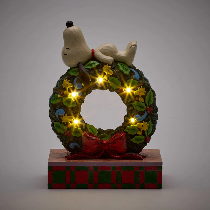 Jim Shore Peanuts: Snoopy Sleeping on LED Wreath Figurine sparkle-castle