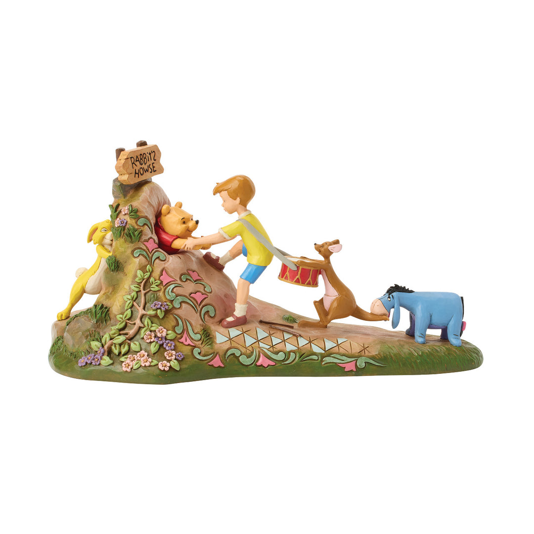 Jim Shore Disney Traditions: Pulling Pooh Out Of Rabbit's House Figurine sparkle-castle