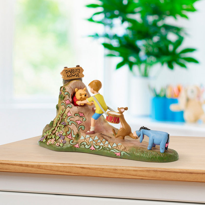 Jim Shore Disney Traditions: Pulling Pooh Out Of Rabbit's House Figurine sparkle-castle