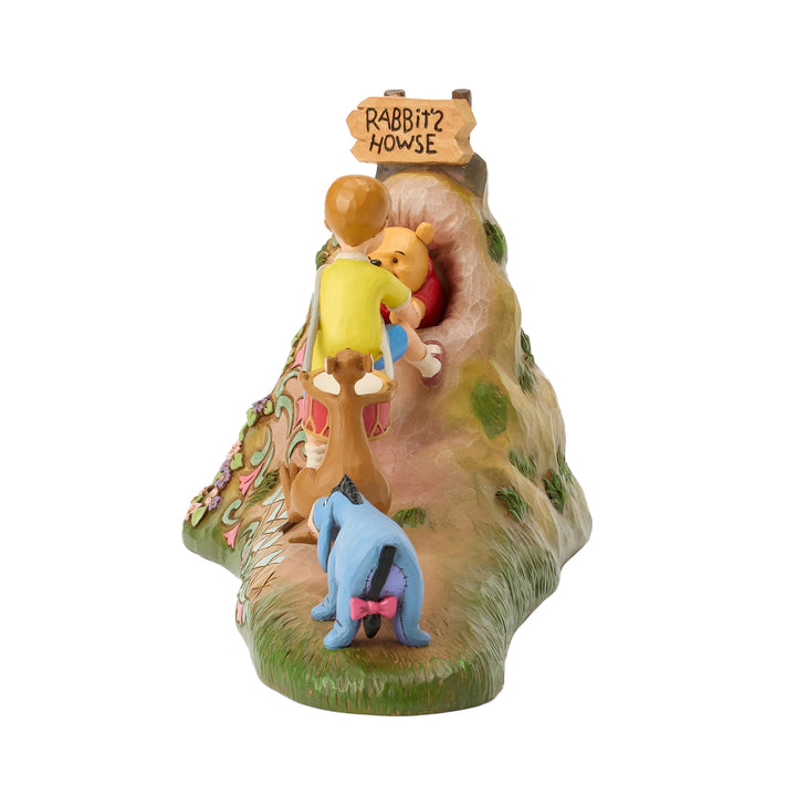 Jim Shore Disney Traditions: Pulling Pooh Out Of Rabbit's House Figurine sparkle-castle
