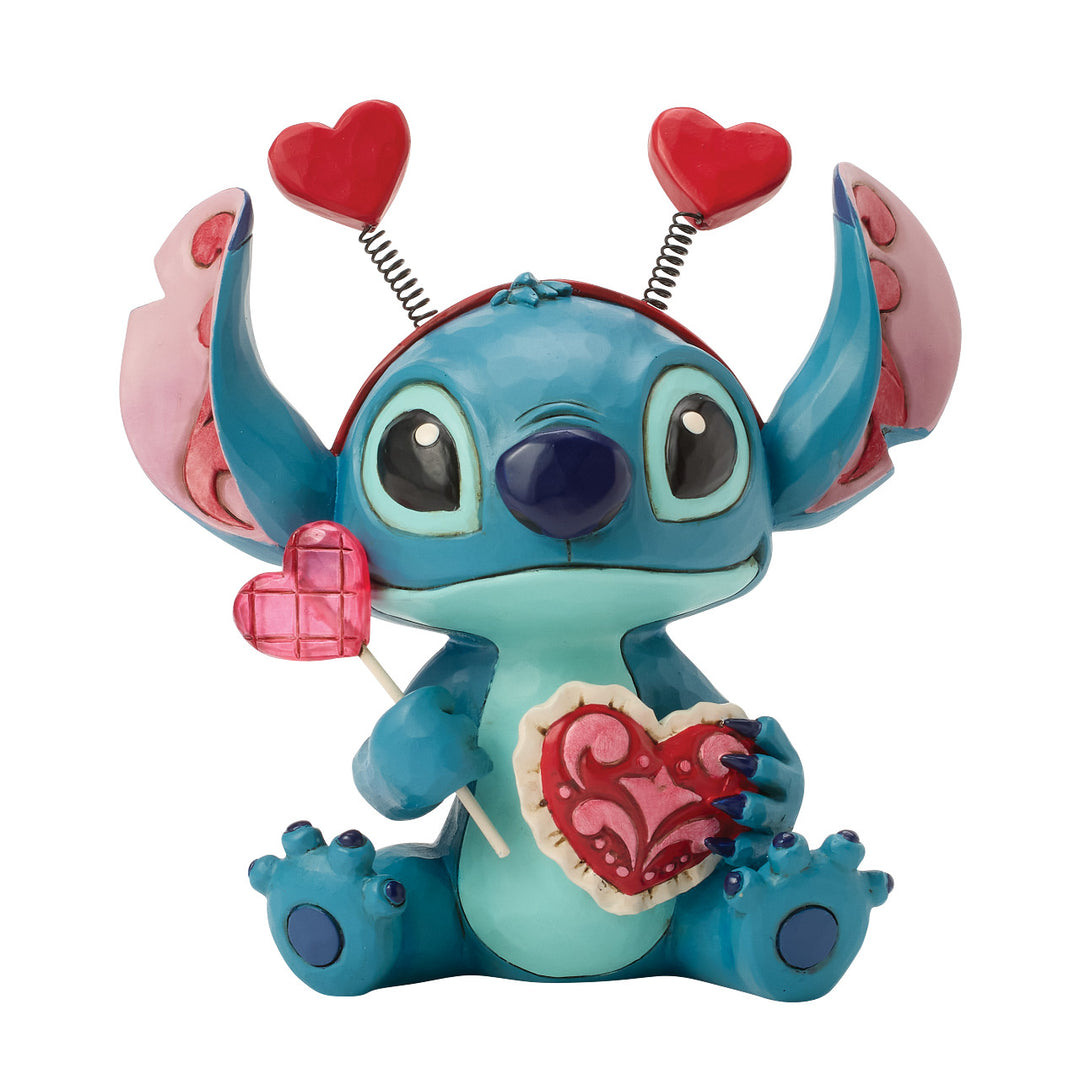 Jim Shore Disney Traditions: Stitch Wearing Hearts Headband Figurine sparkle-castle