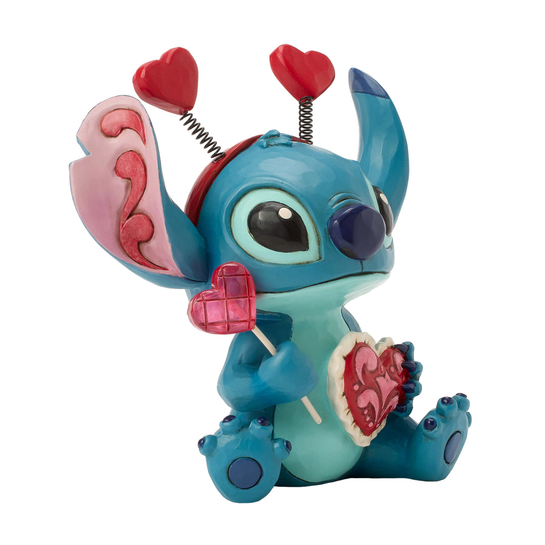 Jim Shore Disney Traditions: Stitch Wearing Hearts Headband Figurine sparkle-castle