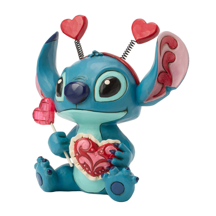 Jim Shore Disney Traditions: Stitch Wearing Hearts Headband Figurine sparkle-castle