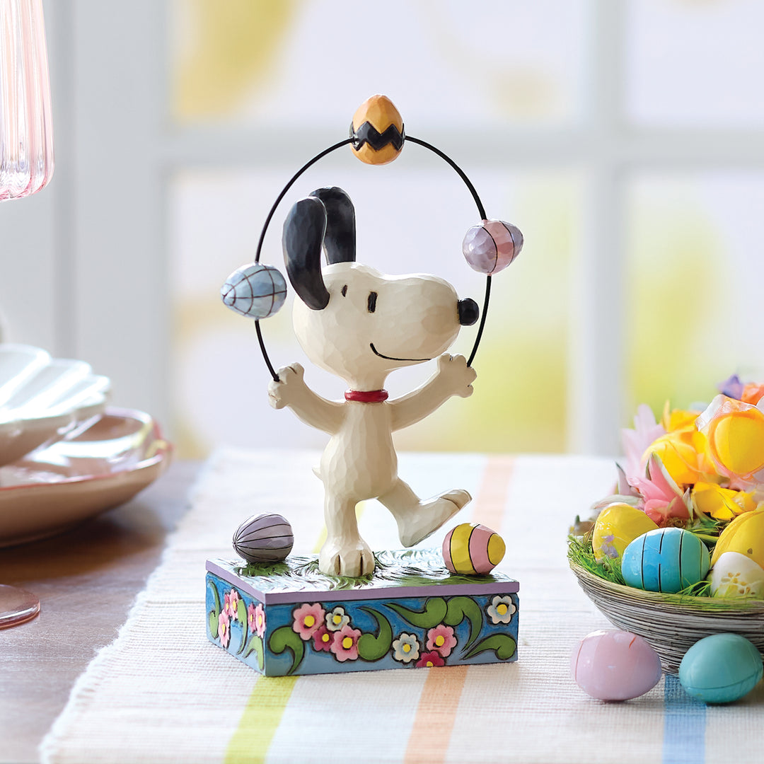 Jim Shore Peanuts: Snoopy Juggling Easter Eggs Figurine sparkle-castle