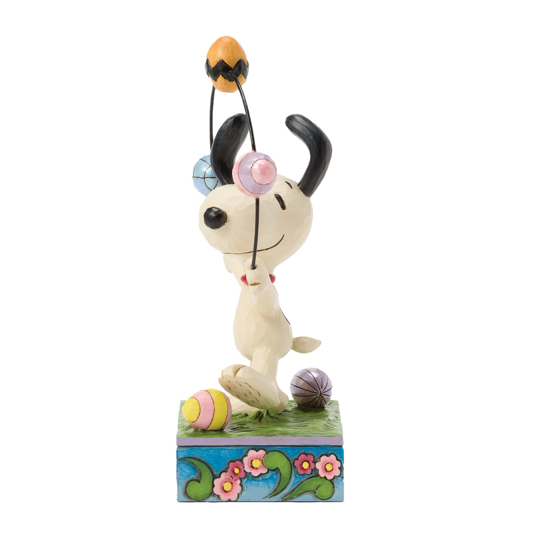 Jim Shore Peanuts: Snoopy Juggling Easter Eggs Figurine sparkle-castle