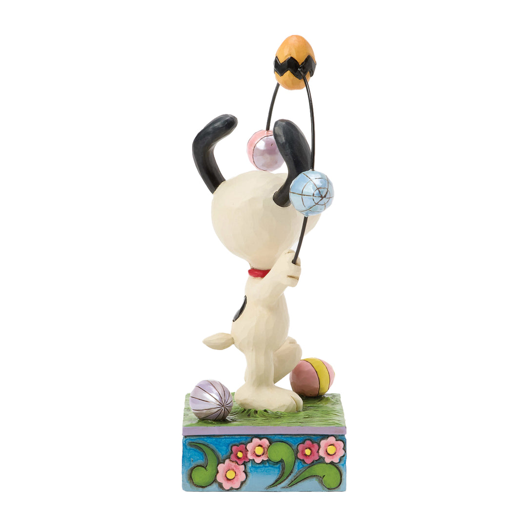 Jim Shore Peanuts: Snoopy Juggling Easter Eggs Figurine sparkle-castle