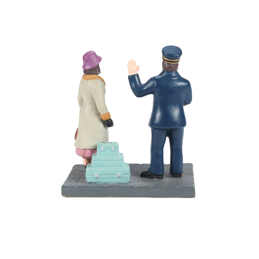 Department 56 Christmas in The City Village Accessory: Calling For A Porter sparkle-castle