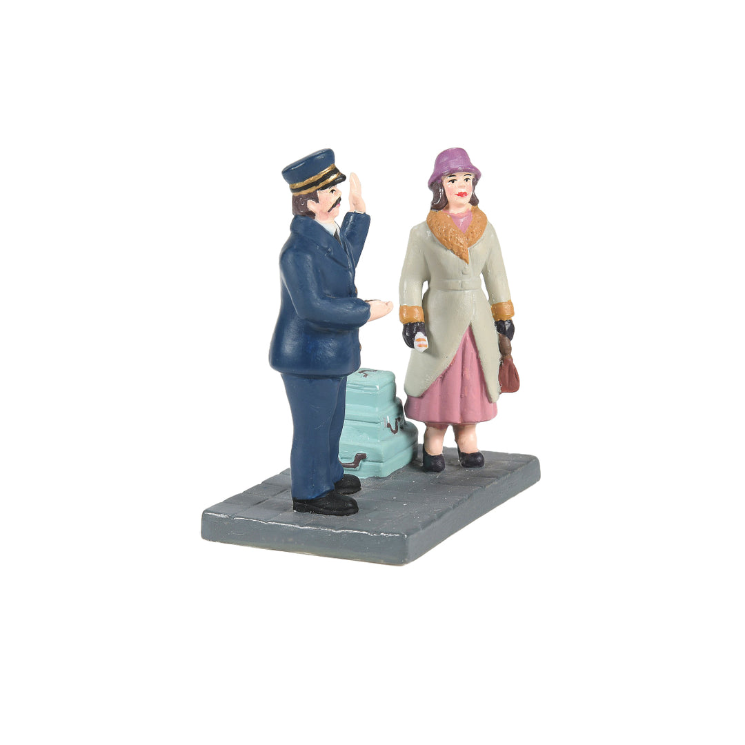 Department 56 Christmas in The City Village Accessory: Calling For A Porter sparkle-castle