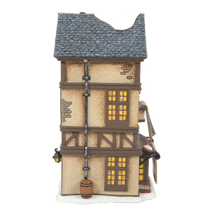 Department 56 Dickens Village: Kingsford Rug Merchant sparkle-castle
