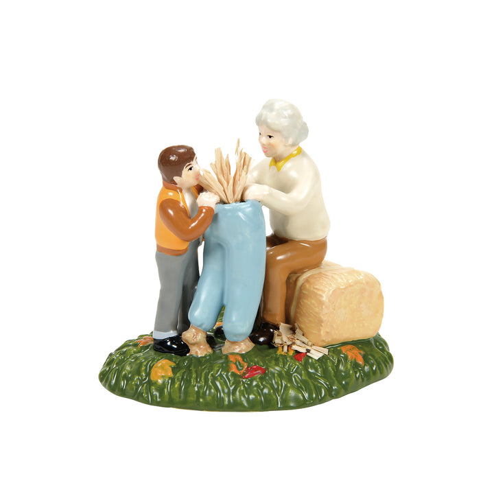 Department 56 Snow Village Harvest Accessory: Nana, I'm Stuffed Scarecrow Shack Figurine sparkle-castle
