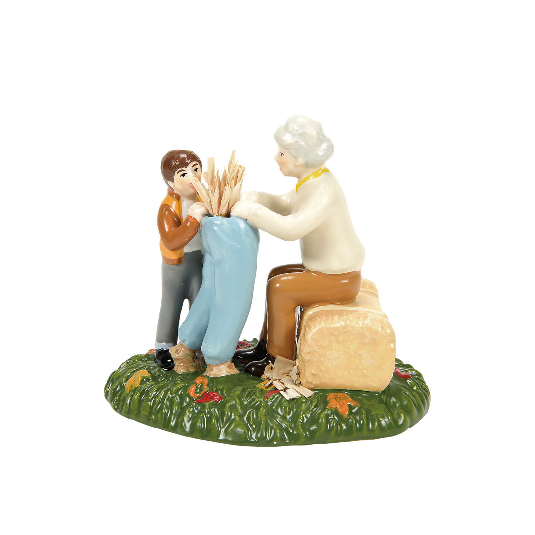 Department 56 Snow Village Harvest Accessory: Nana, I'm Stuffed Scarecrow Shack Figurine sparkle-castle