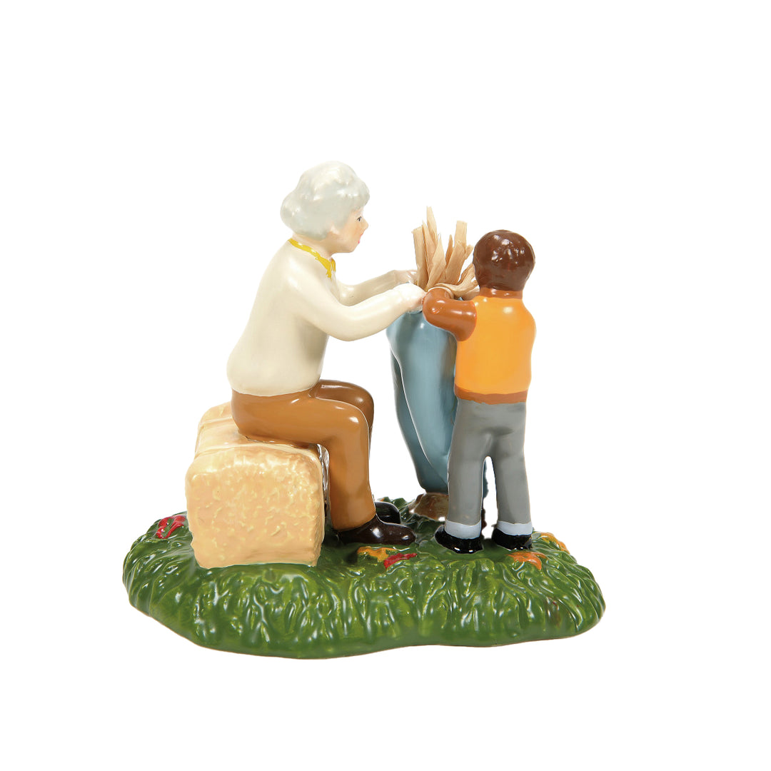 Department 56 Snow Village Harvest Accessory: Nana, I'm Stuffed Scarecrow Shack Figurine sparkle-castle