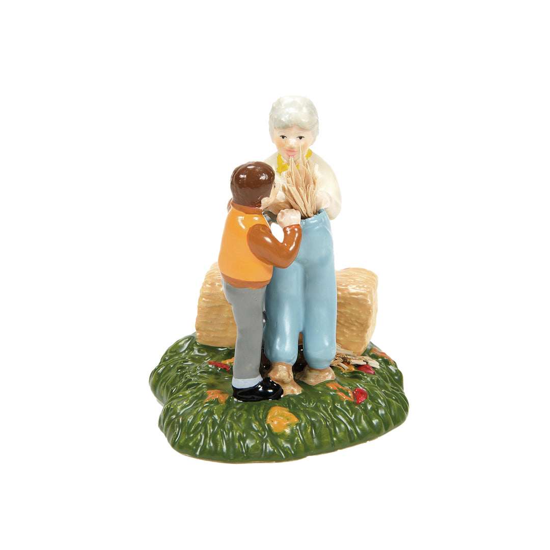 Department 56 Snow Village Harvest Accessory: Nana, I'm Stuffed Scarecrow Shack Figurine sparkle-castle