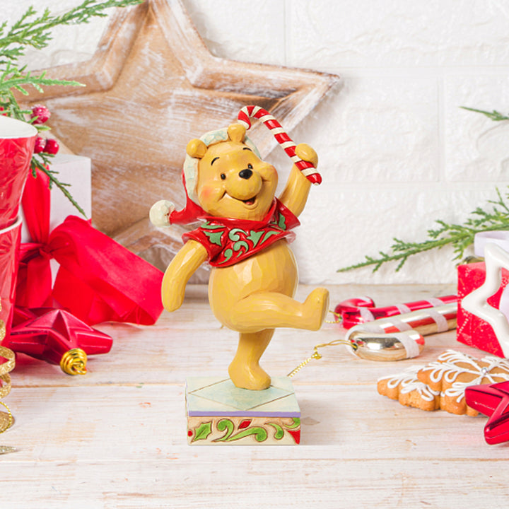 Jim Shore Disney Traditions: Holiday Pooh Figurine sparkle-castle