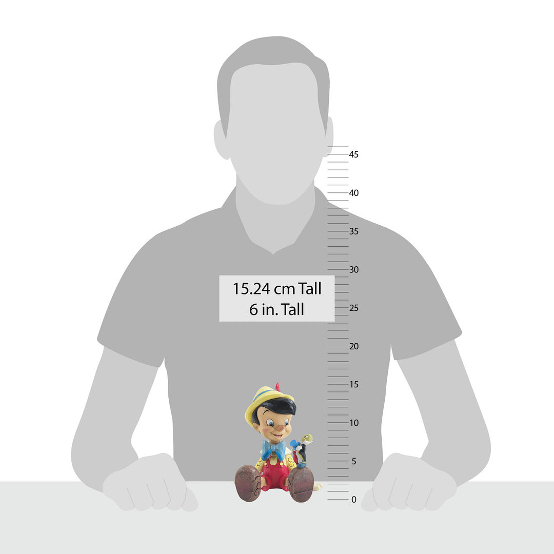 Jim Shore Disney Traditions: Pinocchio & Jiminy Sitting Figurine sparkle-castle