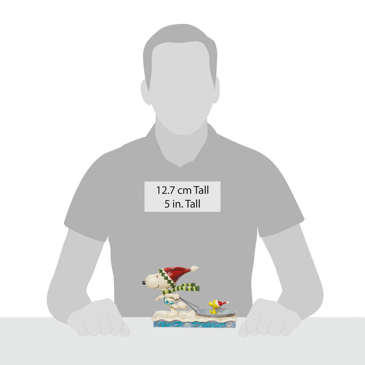 Jim Shore Peanuts: Snoopy Pulling Woodstock on Saucer Figurine sparkle-castle